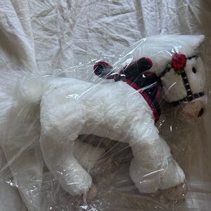 Plush White Horse Dog Toy with Pink Saddle and Rose Accent